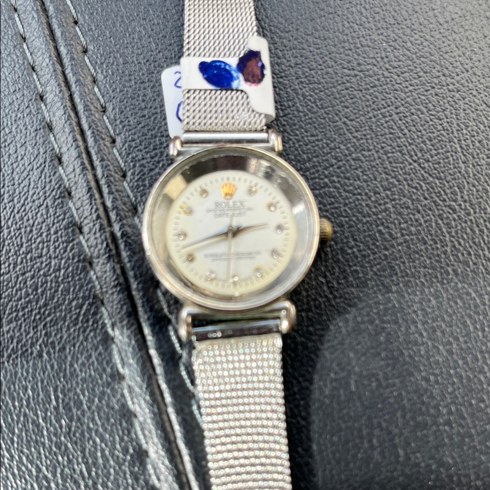 Rolex Silver Watch with White Dial